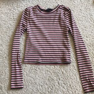 Red, black, and beige top